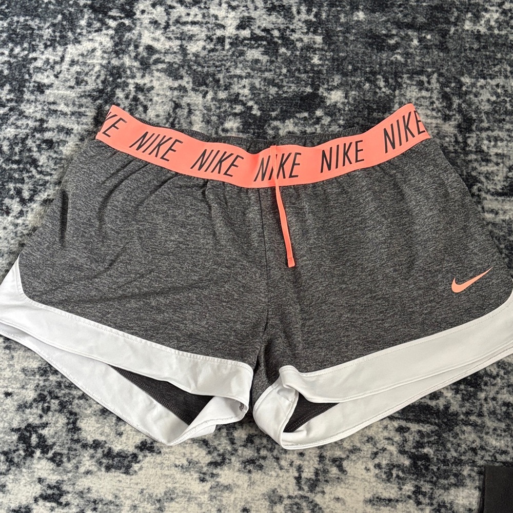 Nike Women's Gray and White Athletic Shorts with Pink Accents